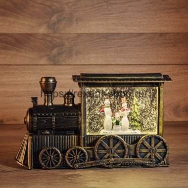 Фотография товара 'Rexant Декоративный светильник "Паровозик" с эффектом снегопада, подсветкой и новогодней мелодией, 501-063'